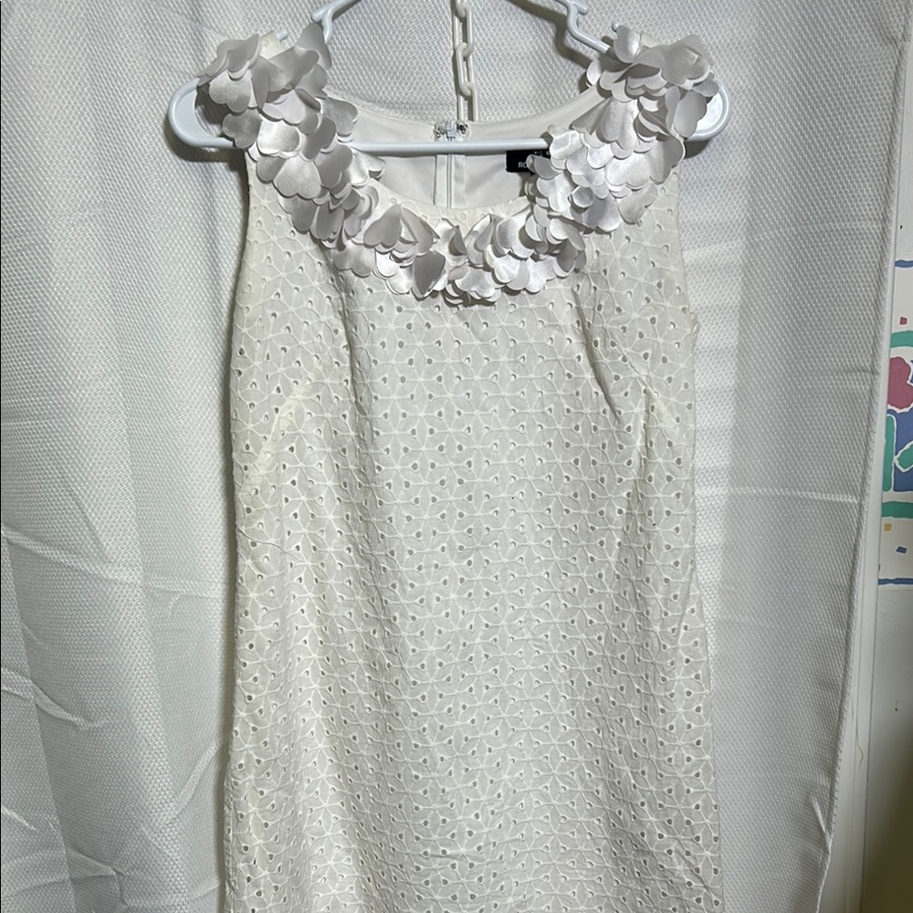 Elegant White Sleeveless Dress with Floral Neckline